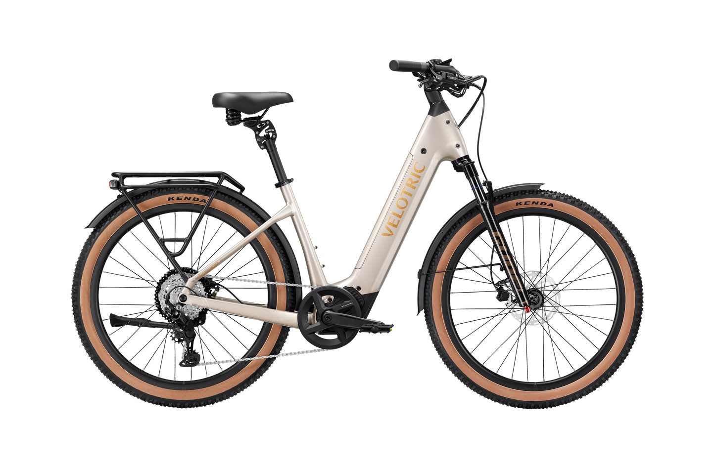 A cream-colored Velotric Discover M comfort eBike by Velotric, featuring a step-through frame, black seat, rear rack, front and rear fenders, and tan tires is shown in profile against a white background.