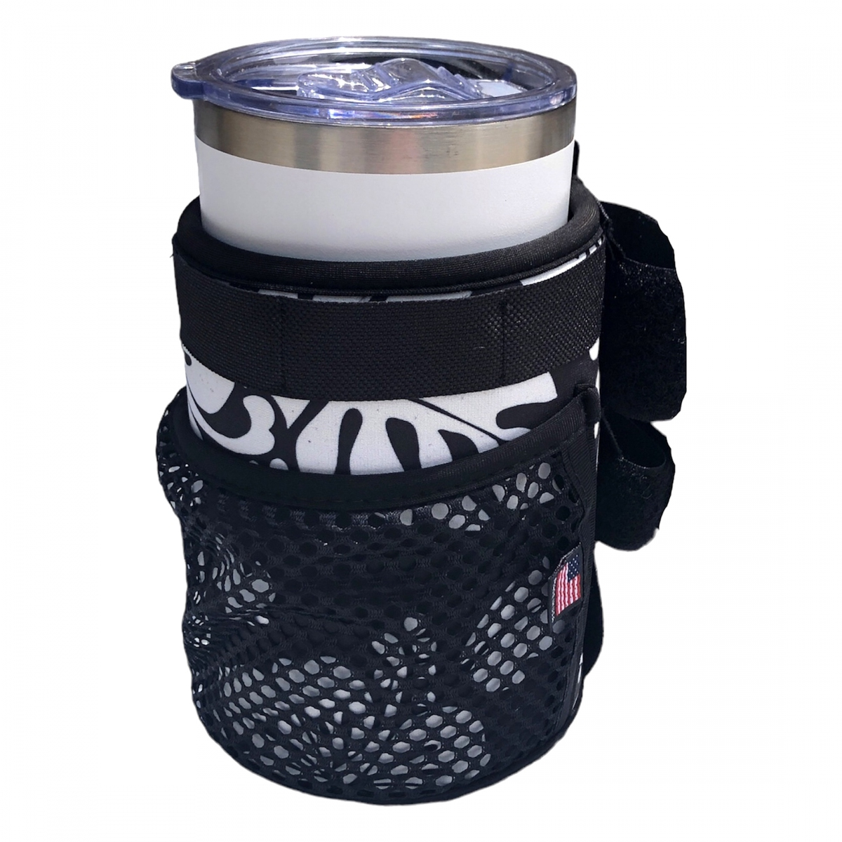 A white travel tumbler with a clear lid sits in the Color Splash Drink Holder—a black mesh insulated carrier with adjustable straps and a small American flag patch.