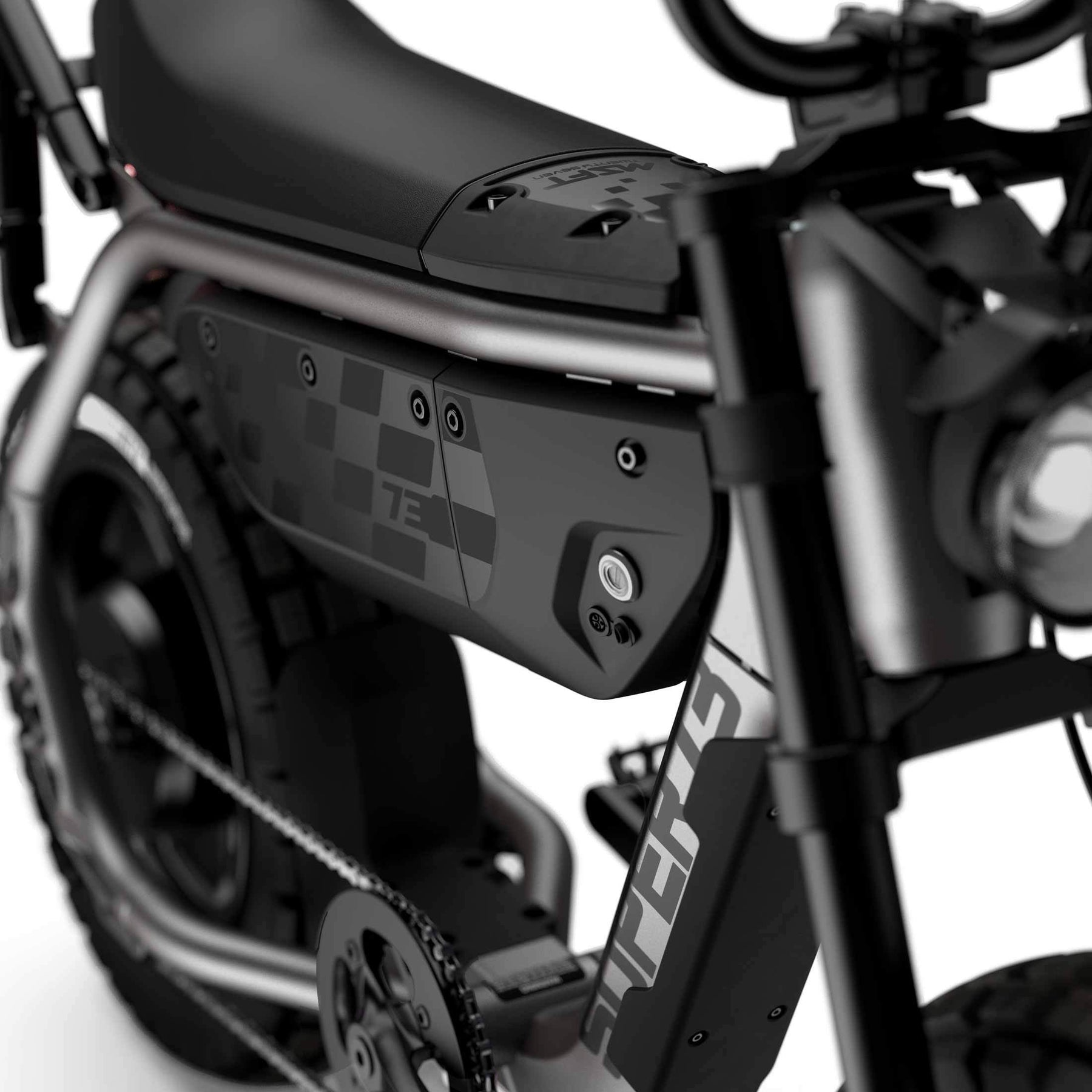 Close-up of the Super 73 - MZFT eBike by Super 73, showcasing its moto-inspired design, textured side panel, thick rear tire, chain, frame details, and visible “AF1” lettering.
