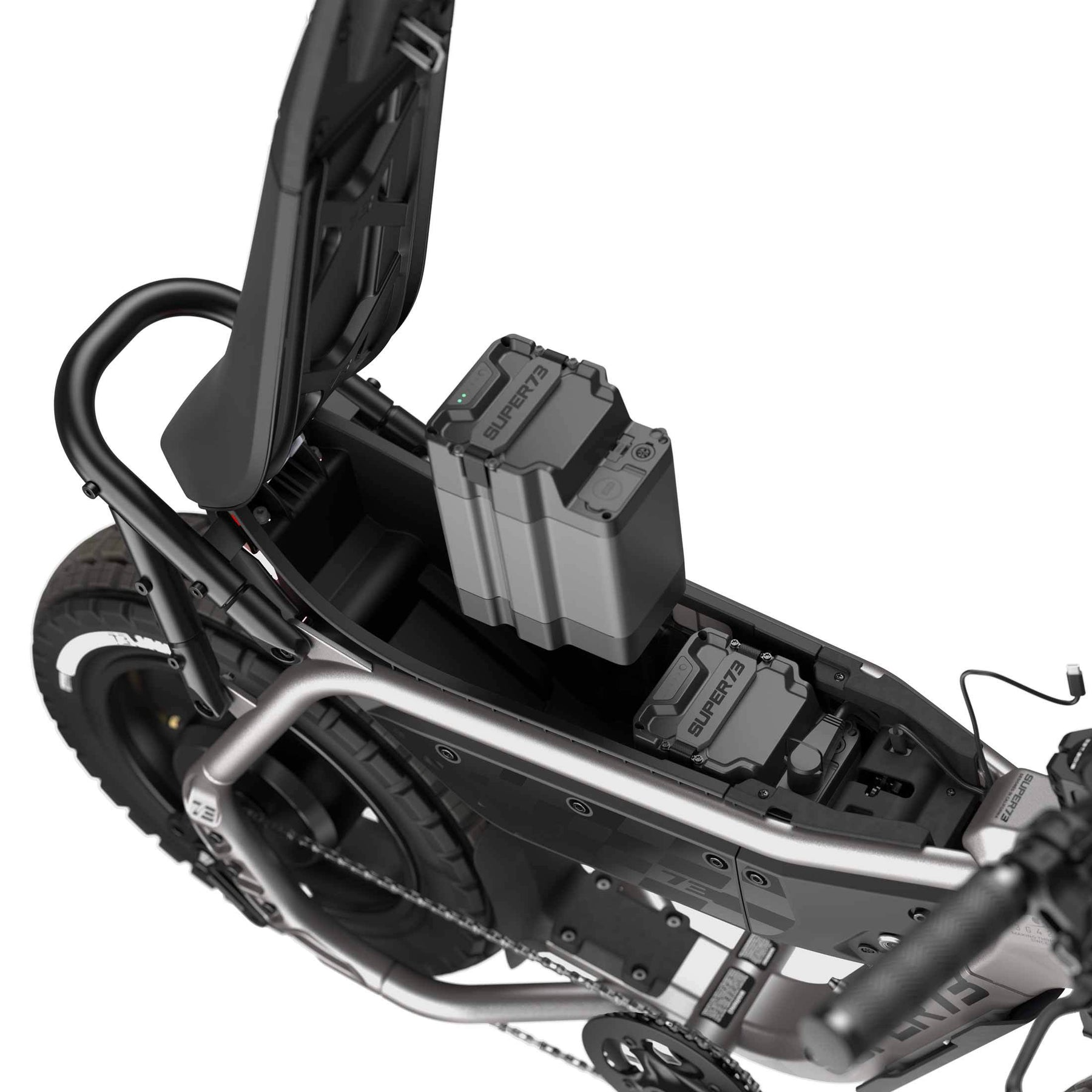 An open compartment on the Super 73 - MZFT electric bike by Super 73 reveals two large batteries securely mounted inside its frame.