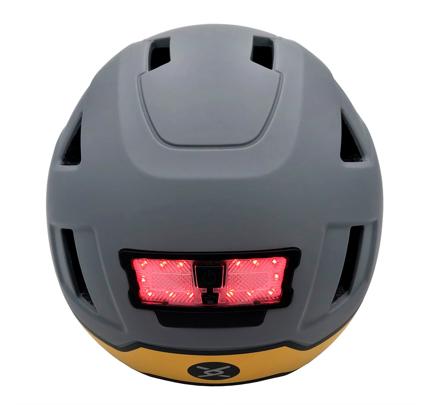 A rear view of a gray and yellow XNITO e-bike helmet with an illuminated brake light integrated into it.