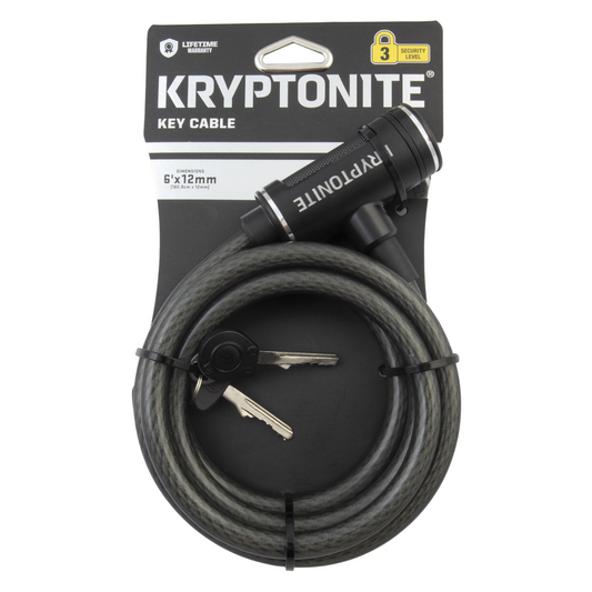 The Voucher Kryptonite Cable Lock by Kryptonite features a coiled braided steel cable, two keys, and comes in black packaging labeled "Kryptonite Key Cable" with a security level indicator—ideal for securing your bike.