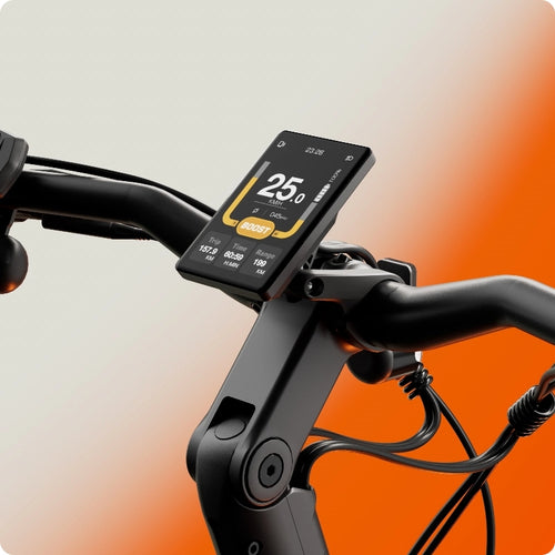 Close-up of the Urtopia - Carbon Classic handlebar by Urtopia, featuring a digital display for speed, battery level, and ride data. This sleek carbon fiber eBike stands out against an orange and white background and is lightweight.