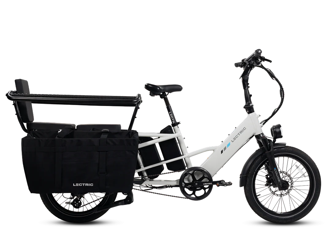 Lectric XPedition2 Cargo Electric Bike by Lectric, featuring a white frame with a black seat, rear bench, two large pannier bags, fenders, and upright handlebars, displayed against a plain white background—ideal for anyone in search of a long-range electric bike from Tampa Bay eBikes.