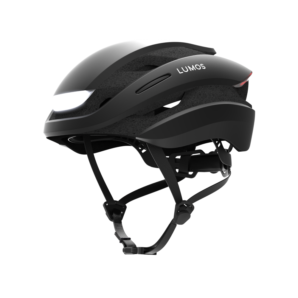 A modern Lumos Ultra MIPS Helmet with integrated lights, MIPS Technology, and a chin strap, isolated on a black background.