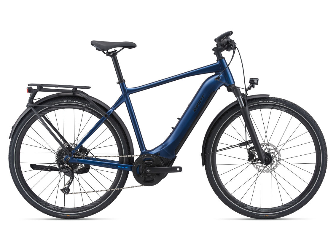 A Giant - Explore E+ 2 GTS eBike on a white background powered by Power Meets Adventure.