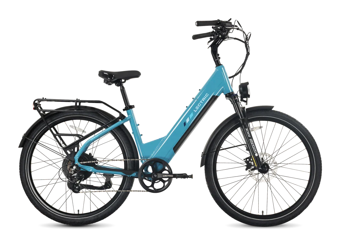 A blue Tampa Bay eBikes Lectric Xpress2, featuring a step-through frame, front suspension fork, rear rack, and fenders, is shown from the side against a white background—a powerful commuter electric bike designed for both style and comfort.