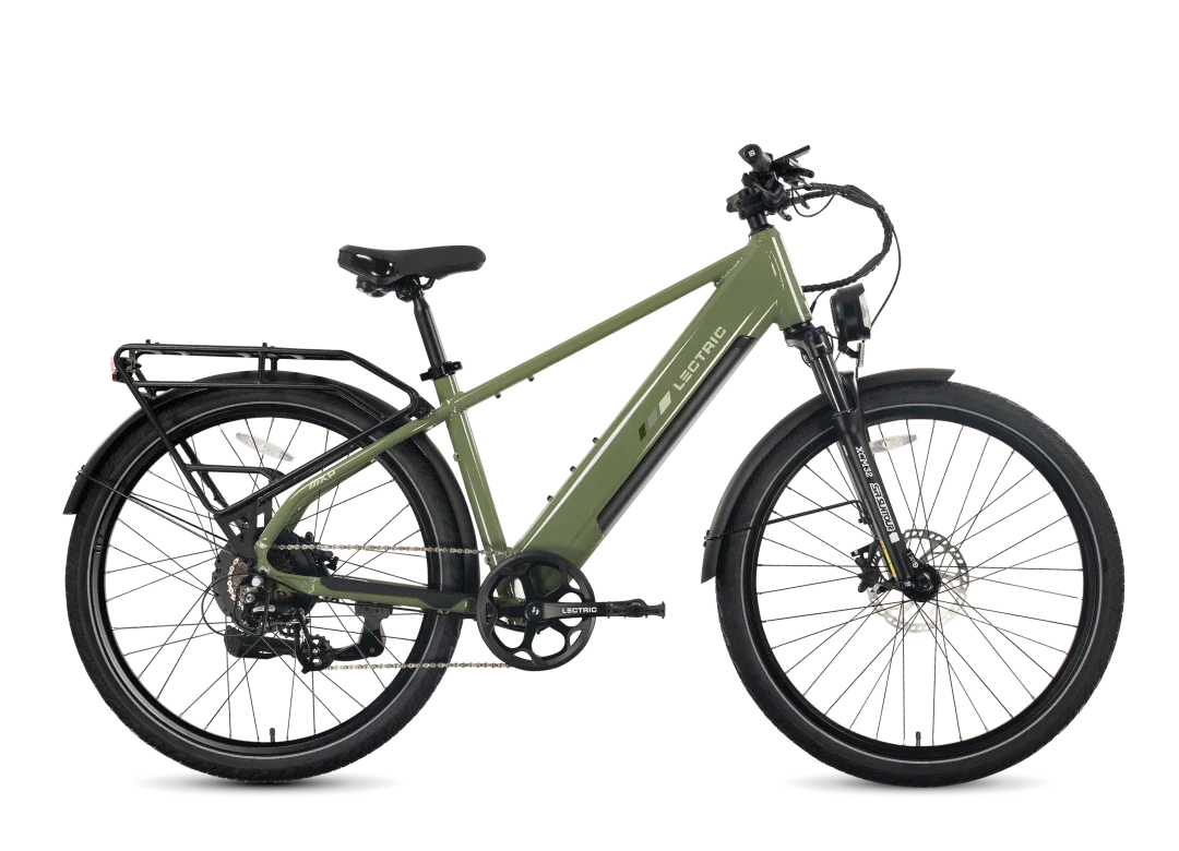 A green Tampa Bay eBikes Lectric Xpress2 is shown from the side on a plain white background, featuring a rear rack, front suspension, and fenders. This powerful commuter electric bike blends practicality and performance in a sleek design.