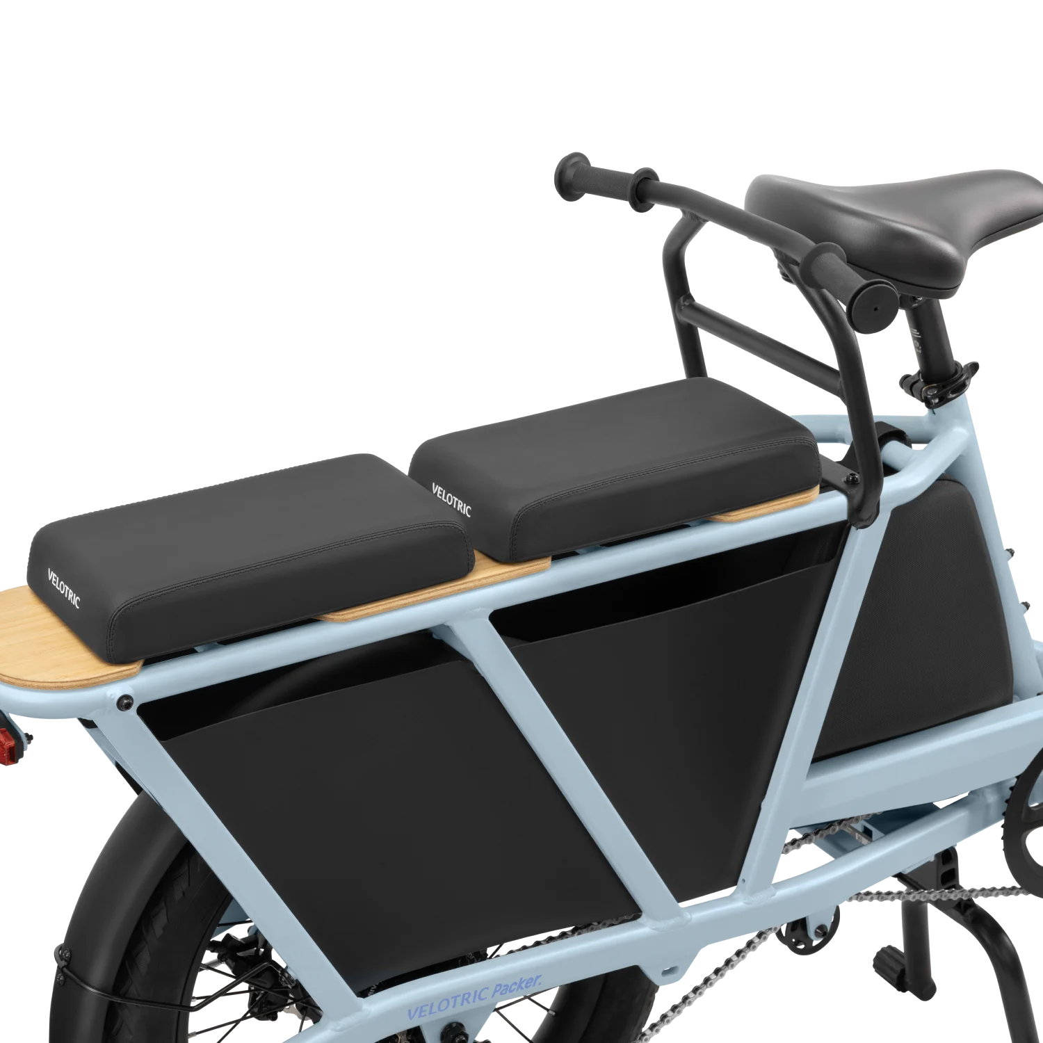 A blue electric bike with a Velotric Packer seat pad, perfect for long-distance riding.