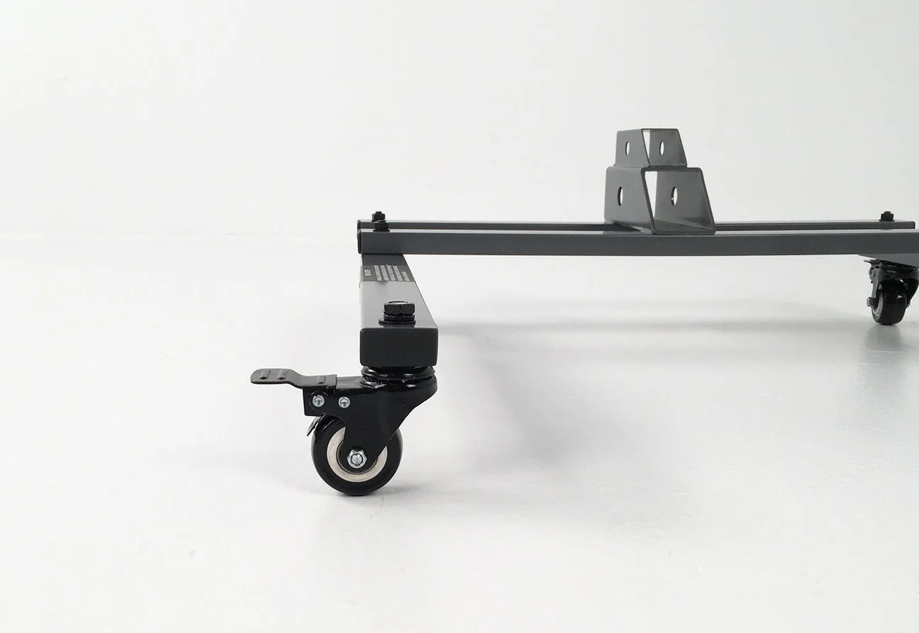The Hollywood Racks - Rack Valet features a low-profile metal frame with caster wheels and sturdy brackets, offering versatile compatibility—even for eBikes—shown on a white floor against a white background.