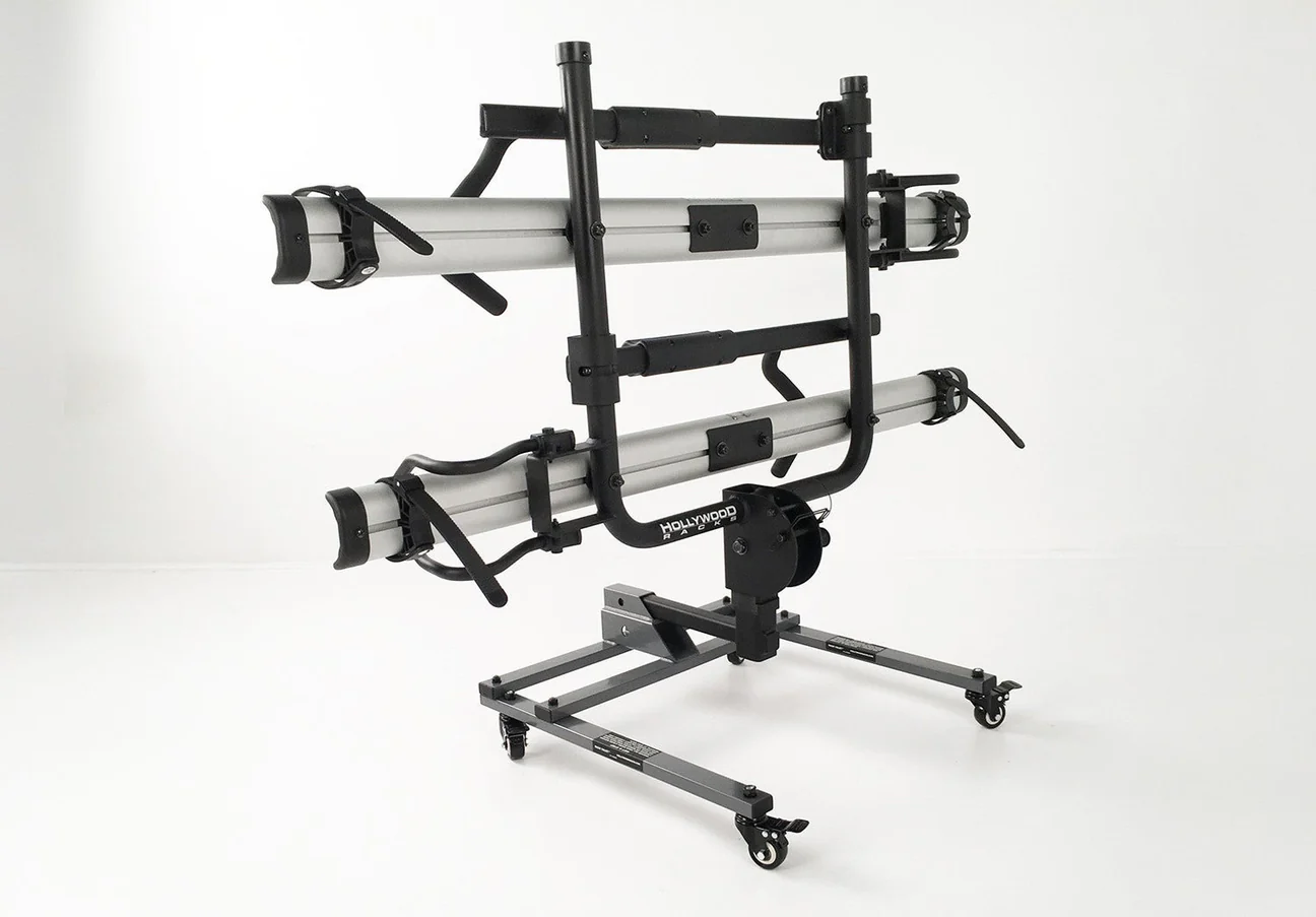 The Hollywood Racks - Rack Valet is a durable metal bike rack with adjustable arms and wheels, designed by Hollywood Racks to securely hold and transport two bicycles or eBikes indoors, offering versatile compatibility.
