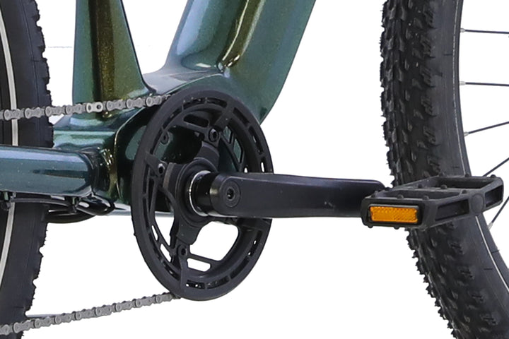 Close-up of the AIMA Rocky's crankset, pedal, chain, and rear wheel, showcasing the drivetrain on the rugged green e-bike frame by AIMA, engineered for trail-ready performance.