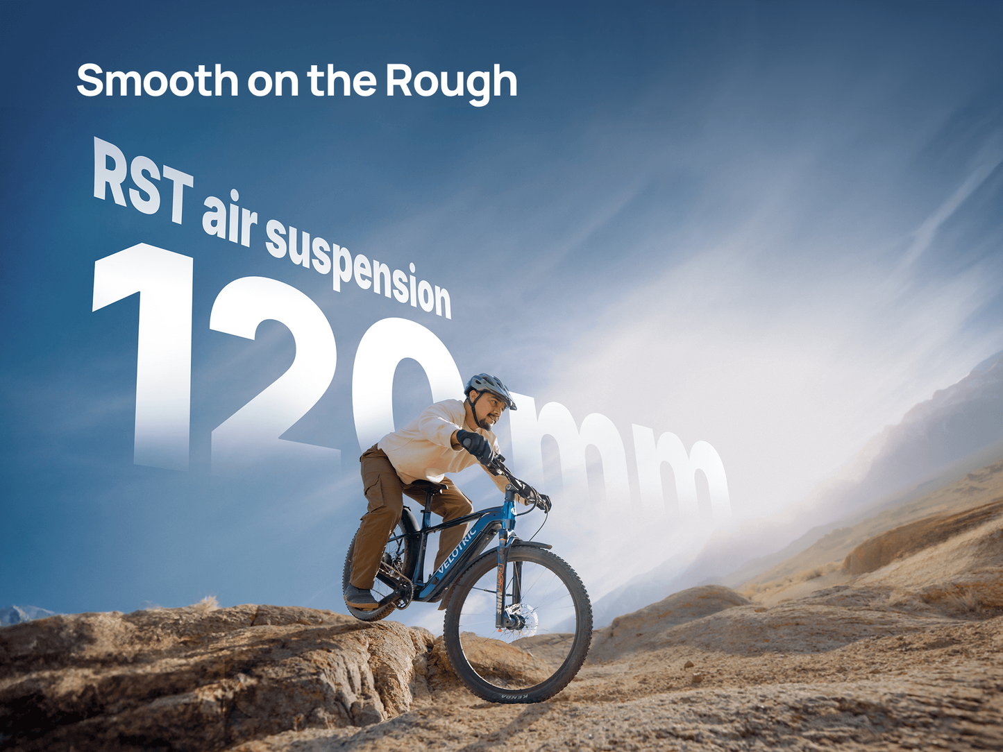 A cyclist rides the Velotric Summit 2 hybrid eBike down a rocky slope under clear skies, with text highlighting "RST air suspension 120mm" and "Smooth on the Rough.