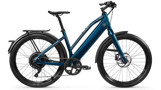 Blue Stromer - ST1 Comfort eBikes with a step-through frame design and mounted fenders.