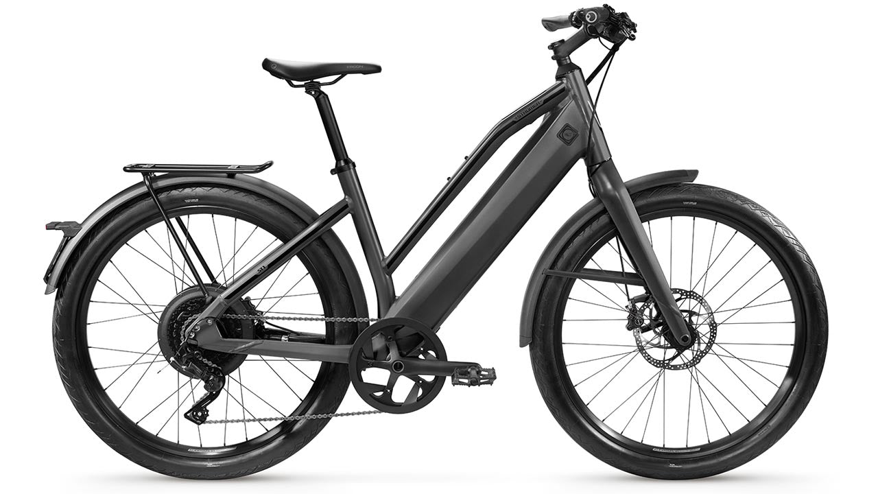 Stromer - ST1 Comfort electric bicycle with a step-through frame and integrated battery on a white background, perfect for the urban cyclist.