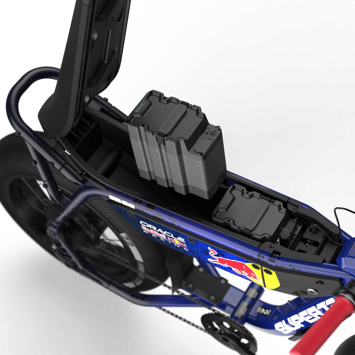 Close up of the open battery compartment showing dual battery capability of the Oracle Red Bull Racing M1D SE ebike in Nightfall Blue.