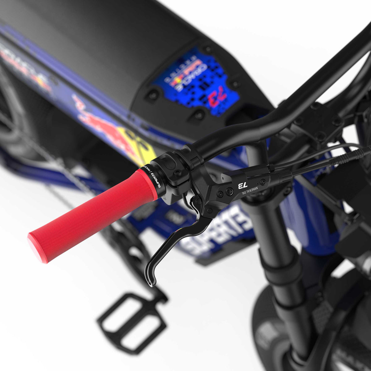 Close up of the brakes and red grips on the Oracle Red Bull Racing M1D SE ebike in Nightfall Blue.
