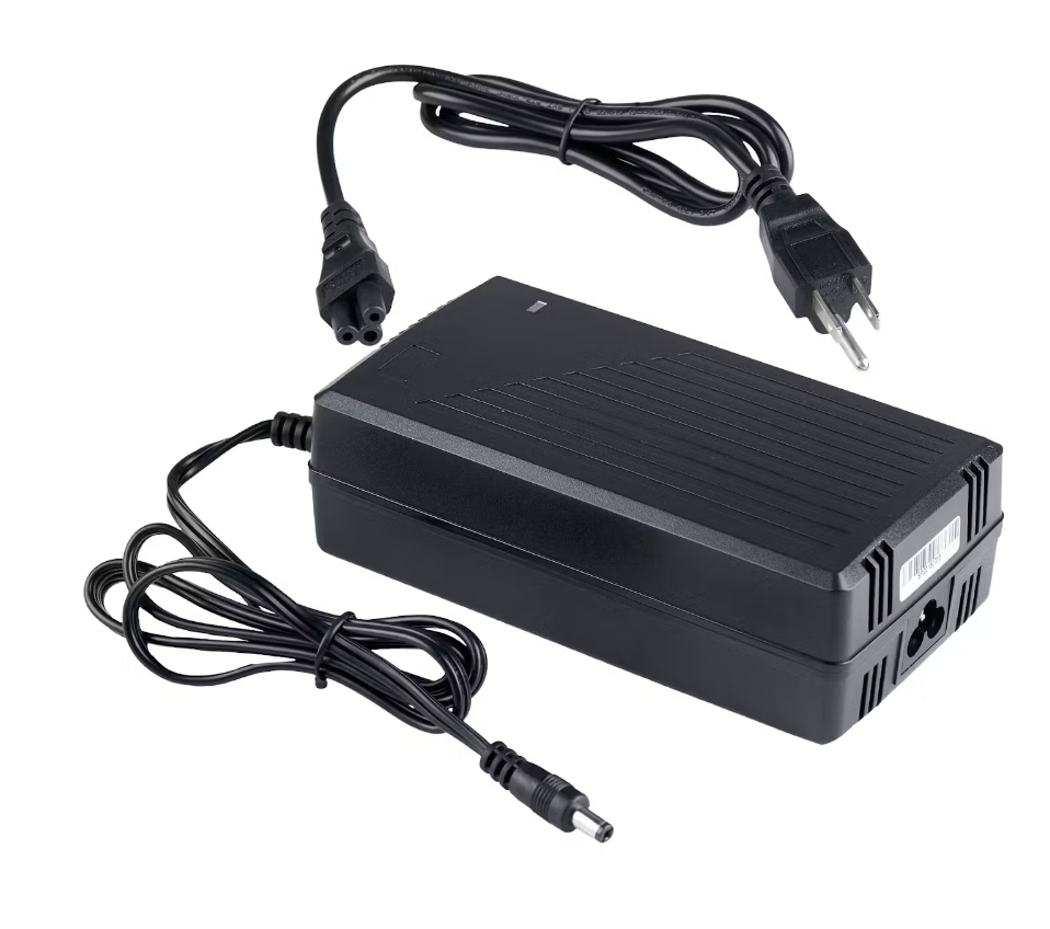 Black Aventon external power supply unit with attached cables and connectors, isolated on a white background.