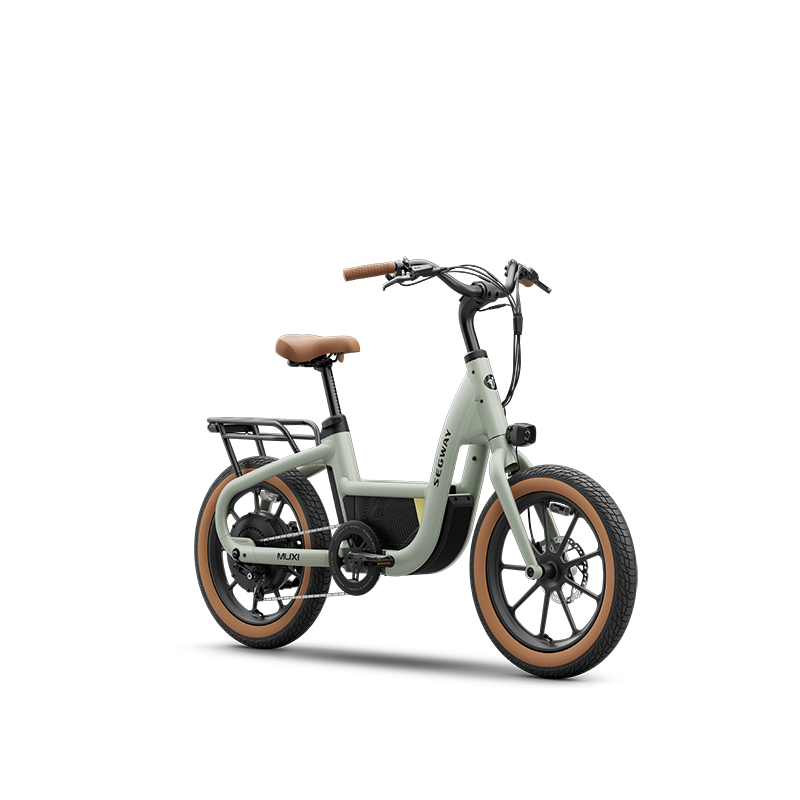 The Segway Muxi electric utility bike features a light gray frame, brown saddle and grips, rear black cargo rack, thick tires, upright handlebars, and a powerful 750W motor with up to an 80-mile range. Displayed on a plain white background.