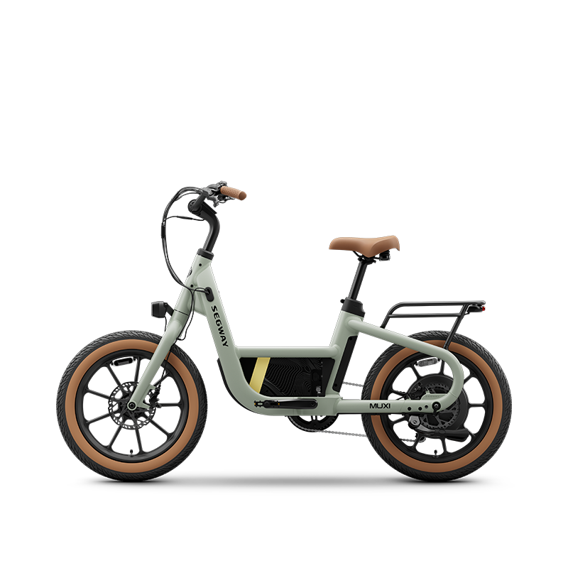 The Segway Muxi electric utility bike by Segway, shown in light green with brown tires and seat, black handlebars, and a rear cargo rack on a white background, features a 750W motor and delivers up to 80 miles of range.