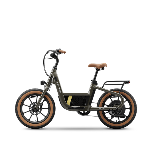 Side view of the Segway Muxi electric utility bike by Segway, with brown tires and saddle, black frame, rear cargo rack, and a central battery. This 750W eBike delivers up to an 80-mile range.
