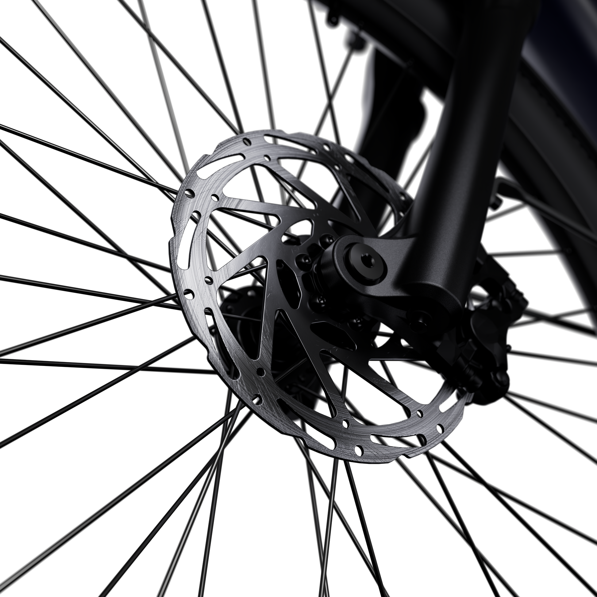 Close-up of the Segway Myon front wheel displays the metal disc brake rotor and spokes—features ideal for commuters. The Segway Myon offers an impressive 80-mile range, making it a top electric bike choice.
