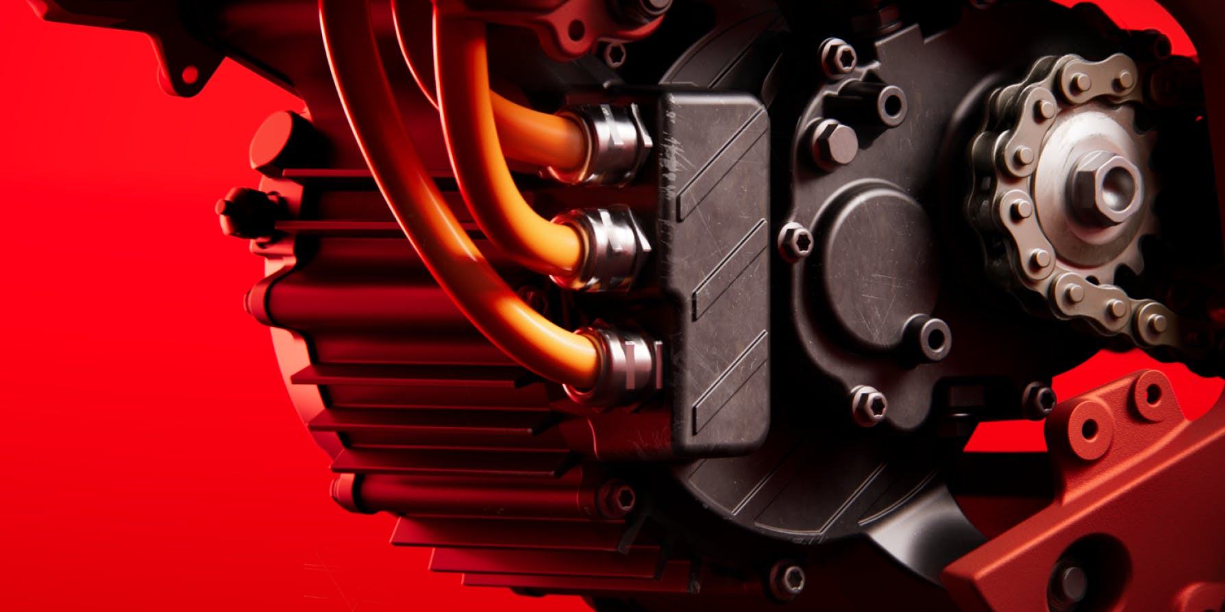 Close-up of the Segway Xaber 300 electric motor by Segway with orange cables and a chain sprocket on a vivid red background, highlighting the power and design of this high-performance electric bike.