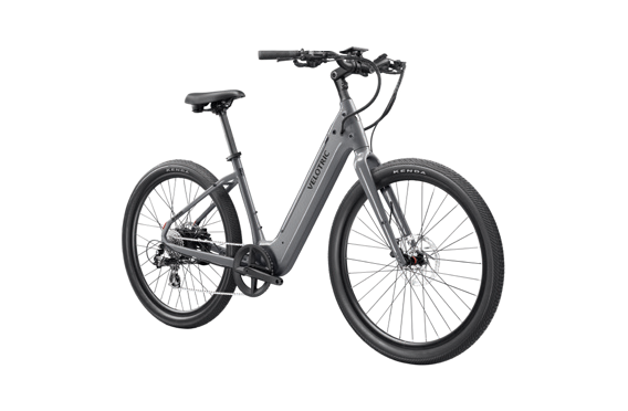 The Velotric - Breeze urban eBike boasts a sleek silver look with thick tires and a powerful 1,750W rear hub motor. Its step-through frame, viewed from the front left angle, perfectly blends style and functionality.