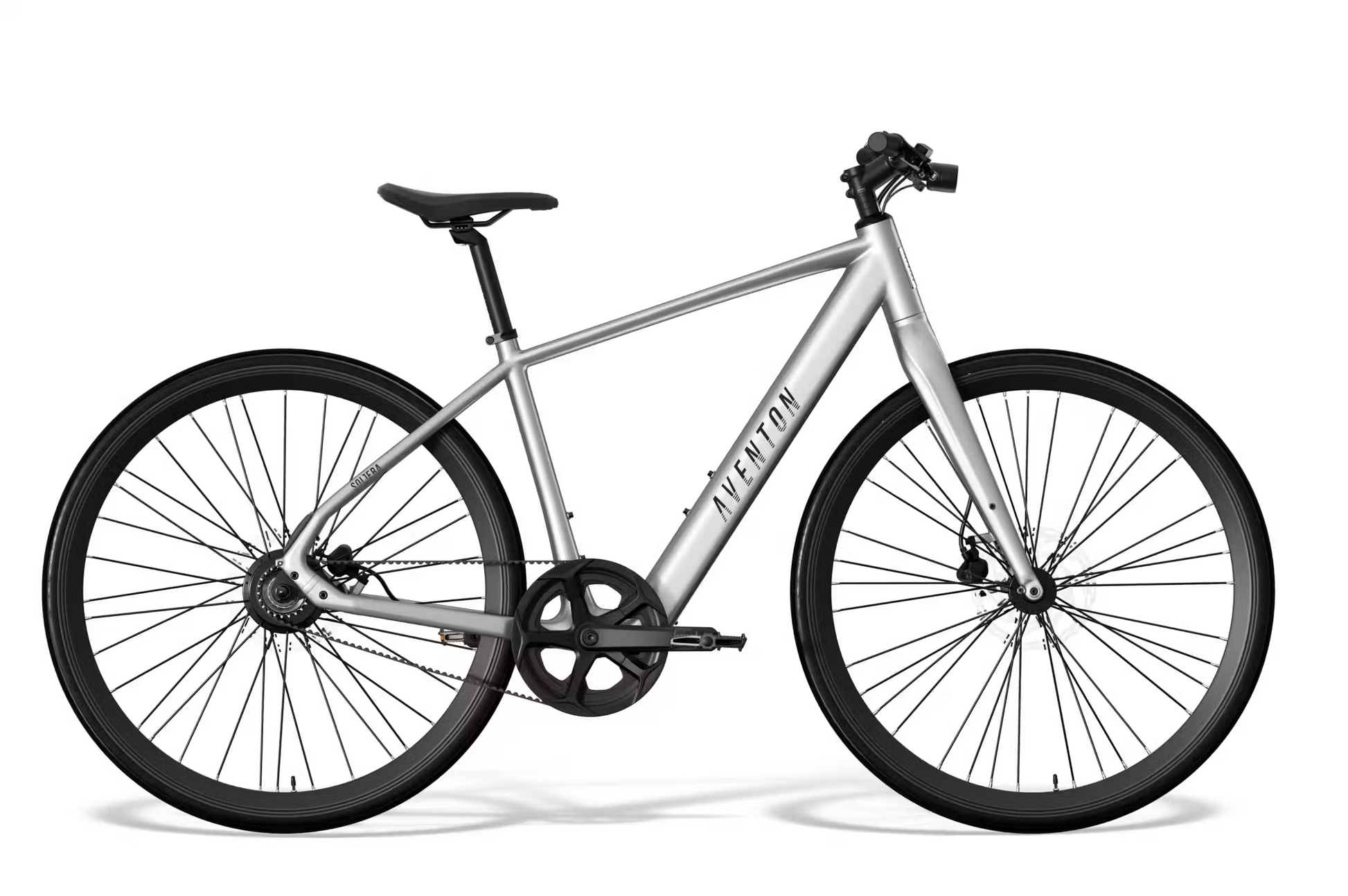 The Aventon Soltera 3 ADV, a silver city ebike with a straight top tube, black saddle and handlebars, is shown from the side on a white background, featuring a smooth and quiet Gates Carbon Belt Drive.