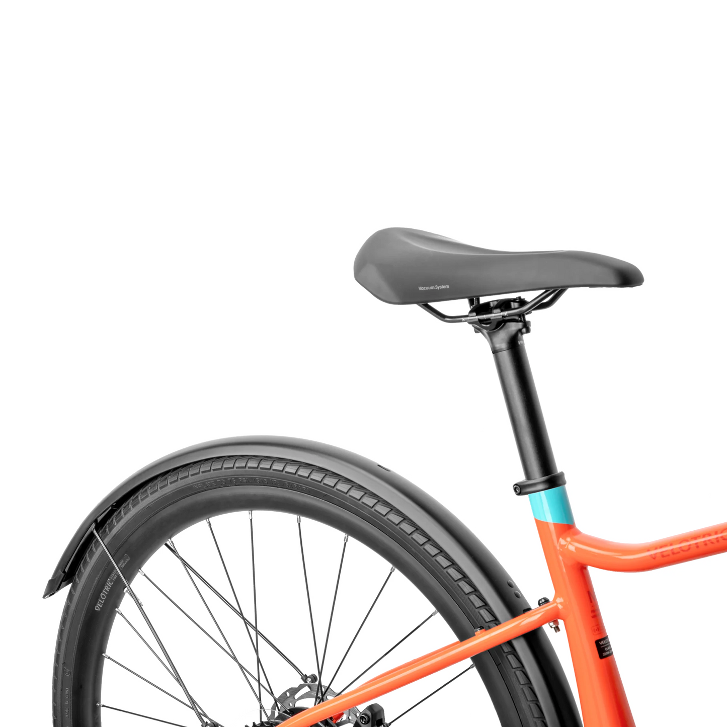 Close-up of the rear section of a Velotric T1 bicycle with an orange frame, black saddle, and black rear fender and tire, showcasing Velotric's sleek T1 Fender Pack for added storage.