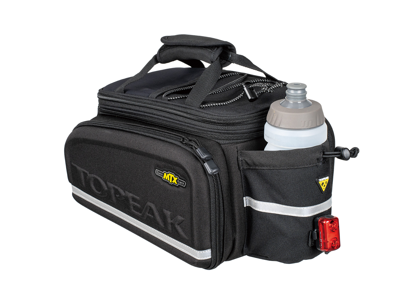 The Topeak MTX TrunkBag DXP by ToPeak includes multiple compartments, a reflective strip, and is compatible with QuickTrack racks. It features a water bottle holder (with bottle) and an attached rear light for enhanced safety and convenience on every ride.