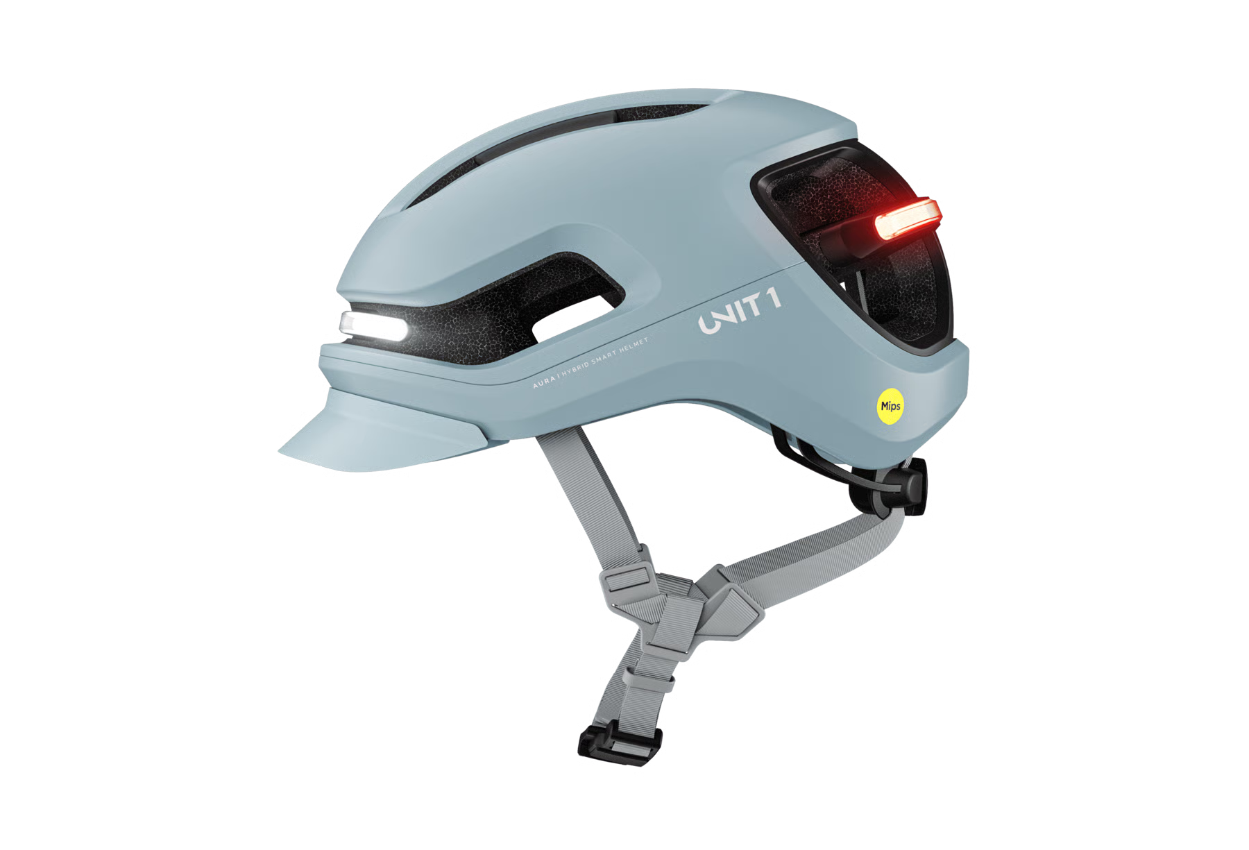 The Unit1 AURA MIPS eBike Helmet by Unit1 is a light blue urban helmet with integrated front and rear LED lights, adjustable straps, and a yellow Mips safety sticker on the side.