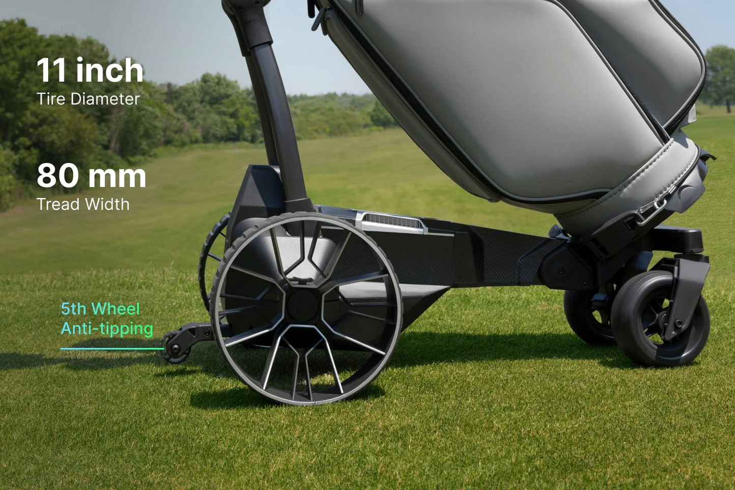 Close-up of the Navee Birdie 3X electric golf push cart by Navee on grass, featuring large rear wheels, a small front wheel, 11-inch tire diameter, 80mm tread width, and a 5th anti-tipping wheel—ideal for Tampa Bay courses.