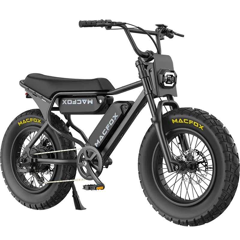 Retro style eBike: The black Macfox X7 by Macfox features thick tires, a front headlight, and pedal assist, displayed on a white background. Available at Tampa Bay eBikes.