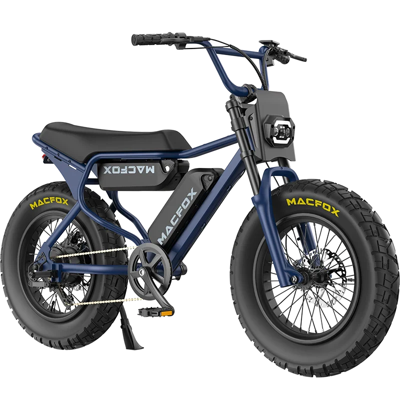 A blue Macfox X7 retro-style eBike with thick tires, a front headlight, and pedal assist is displayed on a white background. Available at Tampa Bay eBikes.