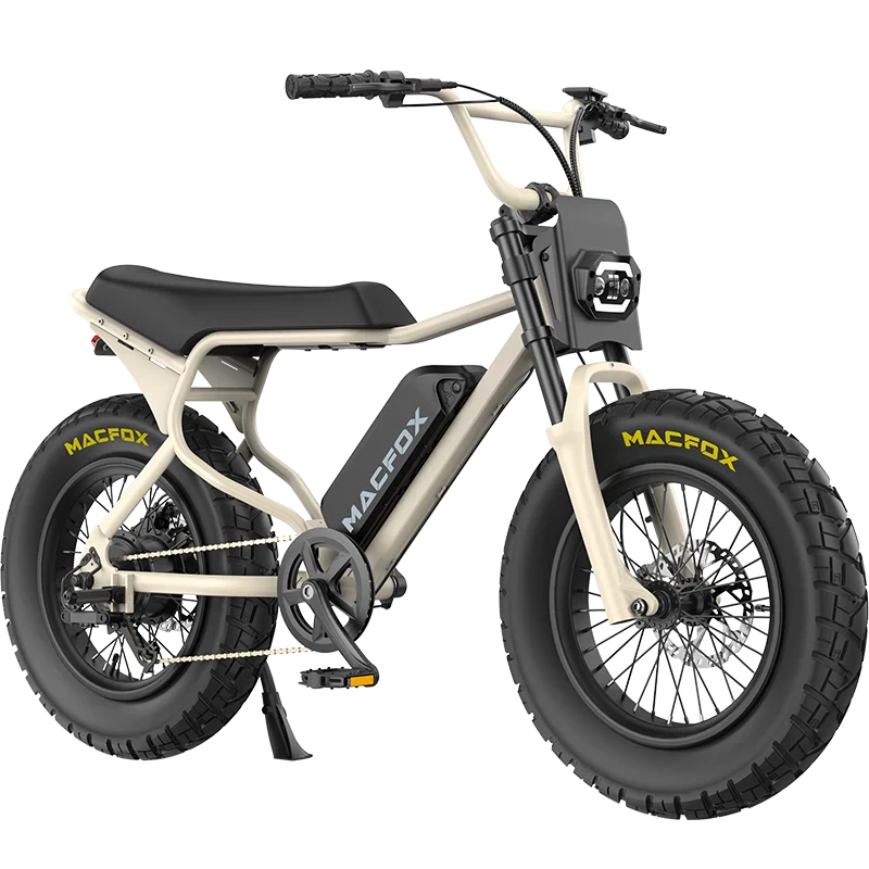 A beige Macfox X7 retro moped-style eBike with bold black Macfox branding, large knobby tires, a rectangular headlight, and a minimalist frame is showcased on a white background by Tampa Bay eBikes.