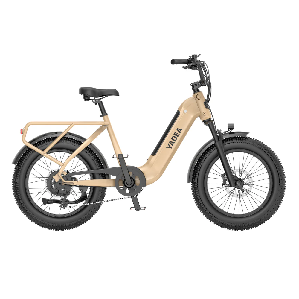 The Yadea - Camper is a beige electric bicycle featuring a step-through frame and powered by a robust 500W battery. It comes equipped with a black seat, durable tires, electric brakes, and includes a rear rack for added convenience. The digital display on the handlebars enhances ease of use during rides.