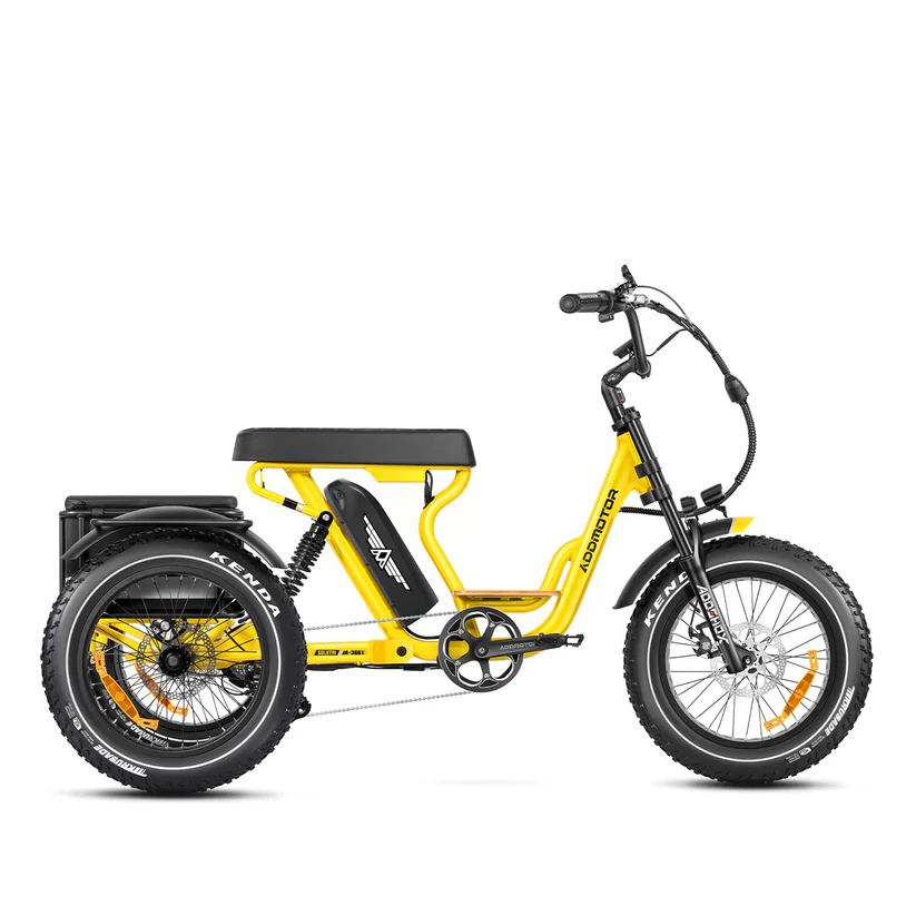 The Addmotor Soletri II M-366X, a yellow electric trike with a black seat, fat tires, 750W motor, and rear cargo rack by Addmotor is shown in profile on a white background.