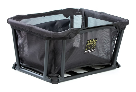 An Aventon front basket kit with a handle on it, ideal for pet-friendly adventures.