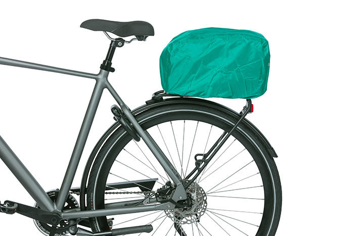 A gray bicycle with a Basil Discovery 365 MIK bag secured on the rear rack using an MIK adapter plate.