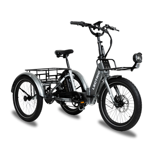 A Lectric - XP Trike, powered by a rear hub motor, is a foldable electric tricycle with a basket on the back.