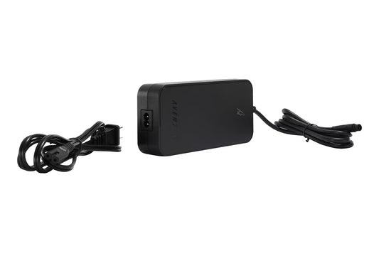 An Aventon Charger for Aventure, Aventure 2, Abound, and Abound AG ebikes is displayed with a detachable power cord, separate output cable, and USA plug against a white background.