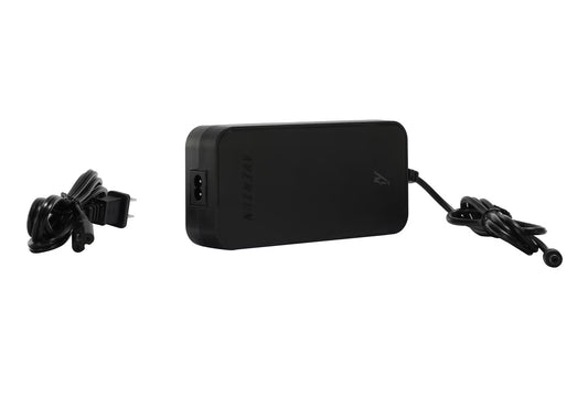 The Aventon charger, compatible with Pace 500, Pace 500.2, Pace 500.3, Level series, and Sinch models, features a black rectangular design with a USA plug and round connector—ideal as a replacement for your Aventon e-bike.