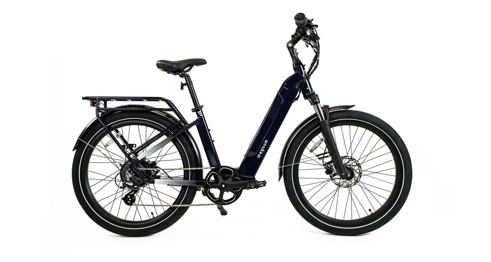 A black Magnum Cosmo 2.0 T e-bike by Magnum, featuring a low-step frame, rear cargo rack, front suspension fork, and disc brakes, is shown in a side view on a white background.