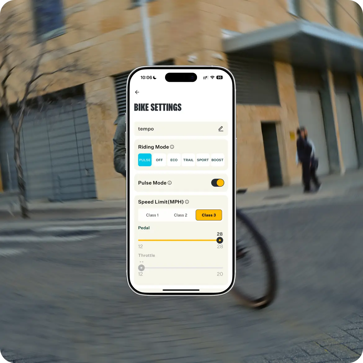 The Velotric Tempo electric bike's settings screen is shown on a smartphone, displaying riding modes, torque-sensing toggle, and speed limit options. The lightweight city eBike by Velotric is depicted on a busy street with a cyclist and pedestrian.
