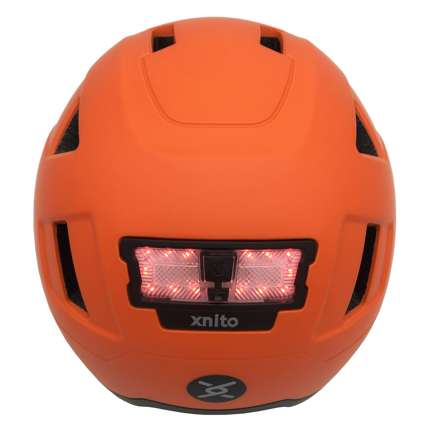 The orange XNITO helmet, called "Helmet XNITO - Old School - Dutch," features a rectangular red LED light at the back for improved visibility and safety.