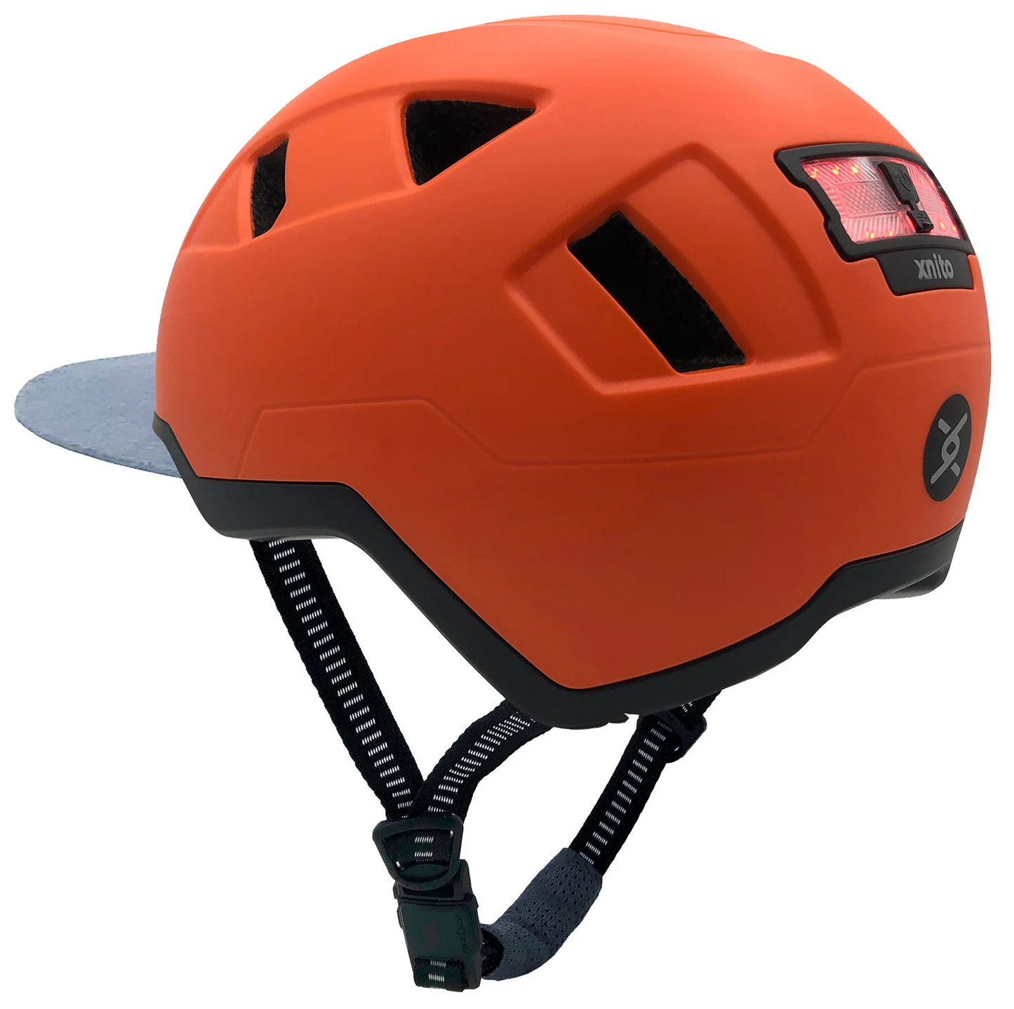 Orange XNITO e-bike helmet with adjustable strap and integrated LED rear light, meeting CPSC and NTA-8776 safety standards.