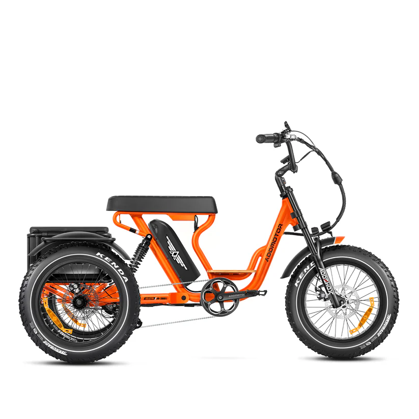 The Addmotor Soletri II M-366X electric trike by Addmotor, shown in profile against a white background, features a bright orange frame, thick tires, black seat, rear cargo rack, upright handlebars, and a powerful 750W motor for smooth rides.
