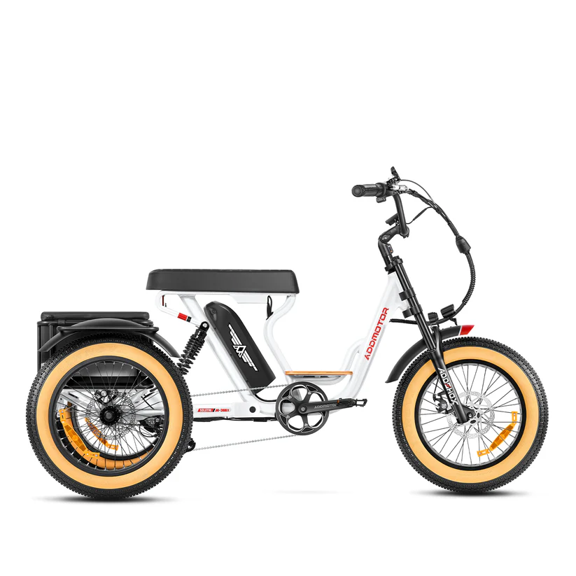 The Addmotor Soletri II M-366X is a white three-wheeled electric trike featuring a black seat, thick beige tires, rear cargo rack, front suspension, and a powerful 750W motor.