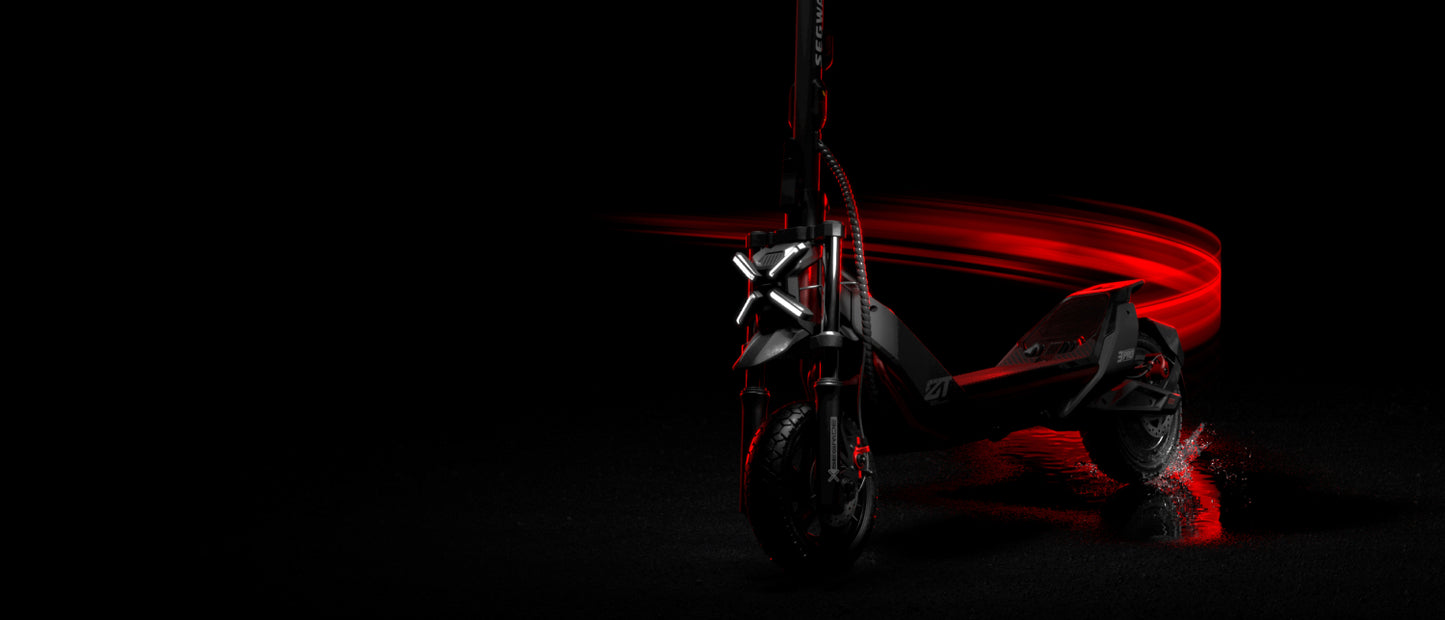 The Segway ZT3 Pro's sleek black design with red lighting effects makes it stand out against dark backgrounds. With advanced suspension, this model promises off-road dominance for adventurous explorers.